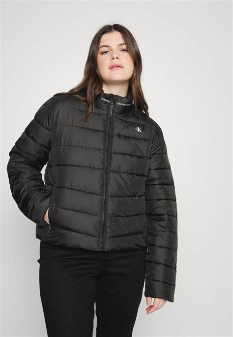 Women COAT | Calvin Klein Jeans Plus REPEAT LOGO JACKET - Winter jacket - black - XL02051 Calvin Klein Jeans Plus black C2Q21U004-Q11 0 en-GB