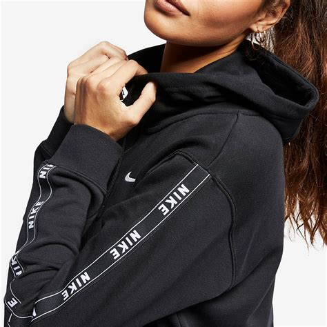 Women PULLOVER | Nike Sportswear TAPE HOODIE - Sweatshirt - black - XE38022 Nike Sportswear black NI121J0IK-Q11 0 en-GB