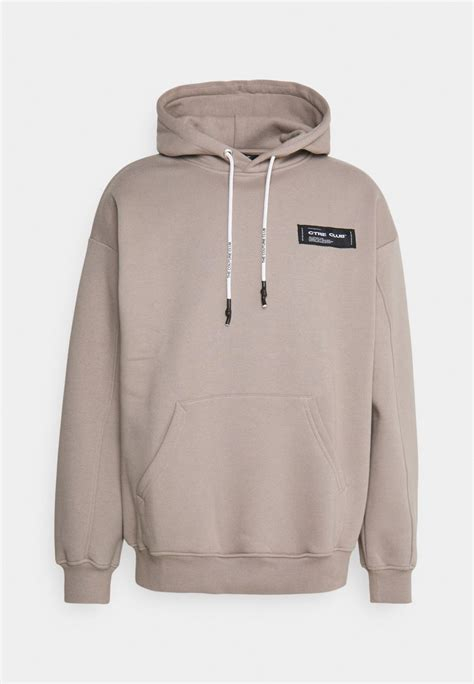 Women PULLOVER | The Couture Club RACER BADGED GRAPHIC HOOD UNISEX - Sweatshirt - beige - XO00256 The Couture Club beige C5A210001-B11 0 en-GB