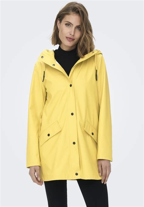 Women COAT | ONLY ONLELISA RAINCOAT - Waterproof jacket - yolk yellow/light yellow - TT89411 ONLY yolk yellow ON321G1GL-E12 0 en-GB
