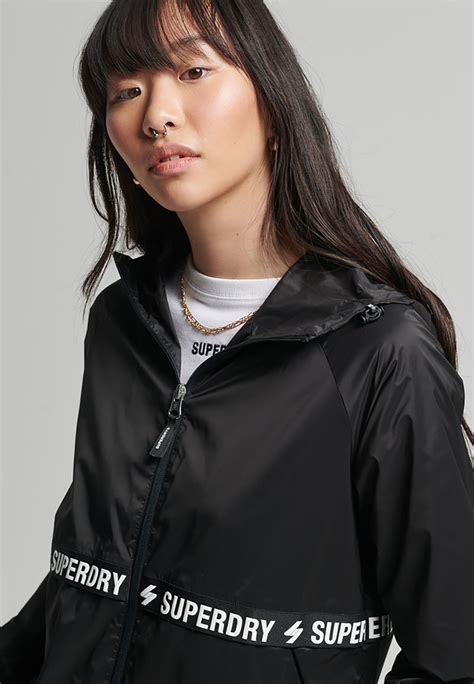 Women COAT | Superdry CODE ESSENTIAL TAPE - Light jacket - black white/black - UE21627 Superdry black white SU221G0GM-Q11 0 en-GB